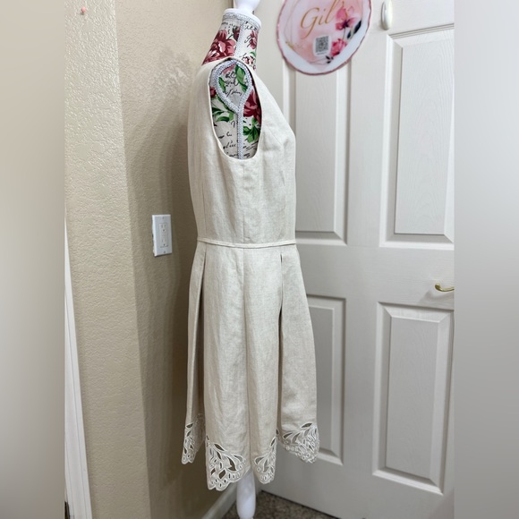 Chic Sleeveless Cream Dress with Lace Hem - Picture 3 of 11